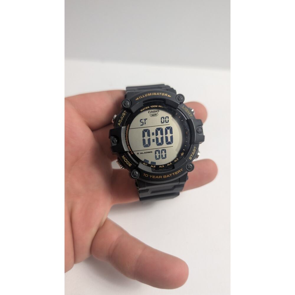 Casio AE-1500WH-8BVCF Digital Watch 100M WR 10 Year Battery Black Gold MSRP